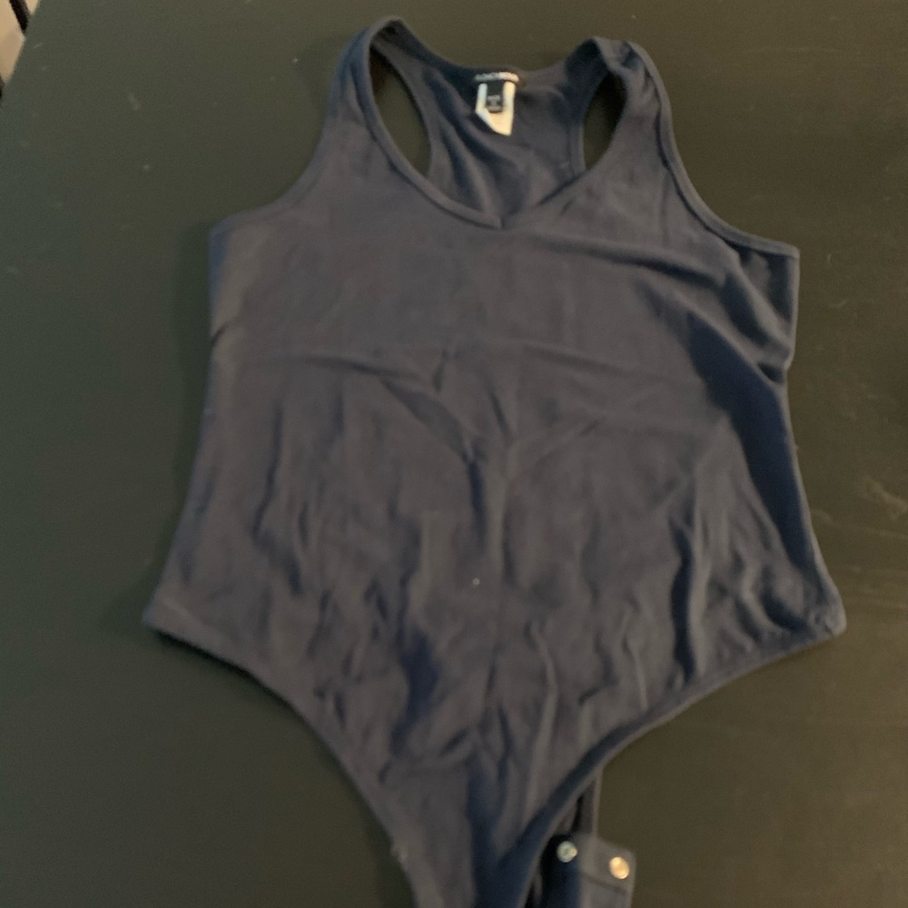 Navy body suit.
